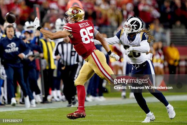 Tight end George Kittle of the San Francisco 49ers fails to make a catch over defensive back Marqui Christian of the Los Angeles Rams at Levi's...