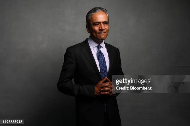 Anshu Jain, president of Cantor Fitzgerald, L.P., poses for a photograph following a Bloomberg Television interview on day three of the World...