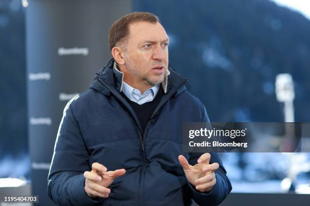 Oleg Deripaska, Russian billionaire, gestures as he speaks during a Bloomberg Television interview on day three of the World Economic Forum in Davos,...