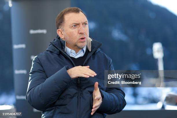 Oleg Deripaska, Russian billionaire, gestures as he speaks during a Bloomberg Television interview on day three of the World Economic Forum in Davos,...