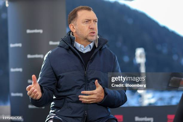 Oleg Deripaska, Russian billionaire, gestures as he speaks during a Bloomberg Television interview on day three of the World Economic Forum in Davos,...