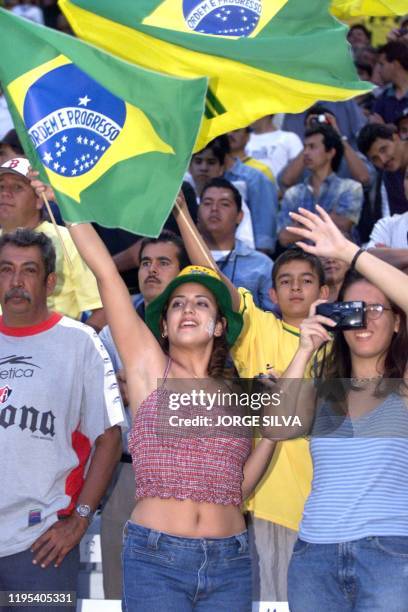 Fans of Brazil's soccer team cheer during their Group B Copa FIFA Confederaciones game against the US in Guadalajara, Mexico, 28 July 1999. AFP PHOTO...