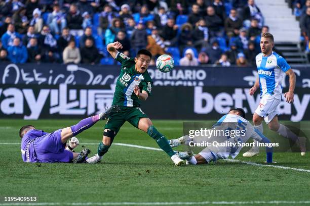 Ivan Cuellar of CD Leganes battles for the ball with Wu Lei of RCD Espanyol during the Liga match between CD Leganes and RCD Espanyol at Estadio...