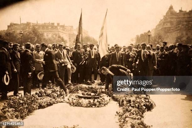 The laying of flowers on the Tomb of the Unknown Soldier from World War One at the Arc de Triomphe in Paris by the Uruguay football captain Jose...