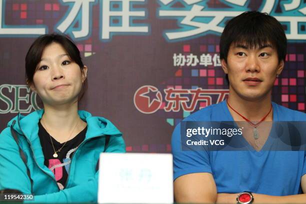 Chinese skaters Zhang Dan and Zhang Hao attend 'Artistry On Ice' press conference at Mercedes-Benz Arena on July 21, 2011 in Shanghai, China.