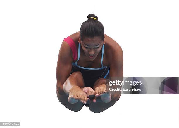 Diana Pineda of Colombia competes in the Women's 3m Springboard preliminary round during Day Seven of the 14th FINA World Championships at the...