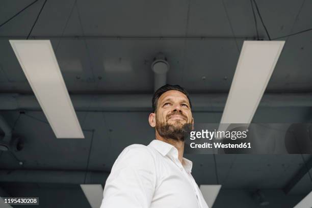 low angle portrait of confident mature businessman - low angle view stockfoto's en -beelden