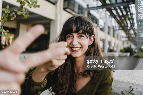 woman and man playing scissors paper stone - rock paper scissors stock pictures, royalty-free photos & images