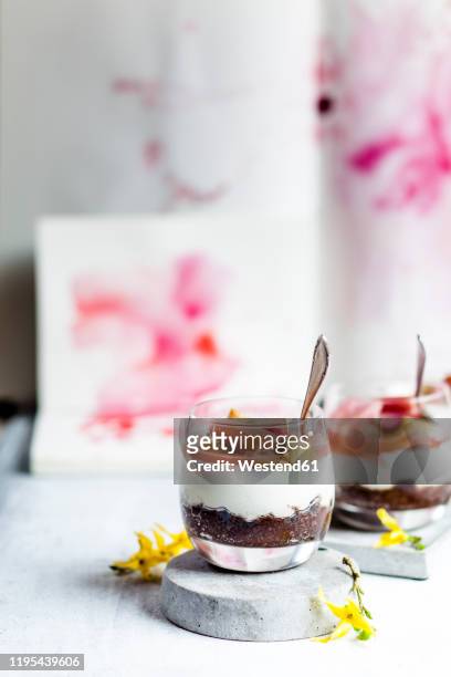 glasses of rhubarb cheesecake - rhubarb cheesecake stock pictures, royalty-free photos & images