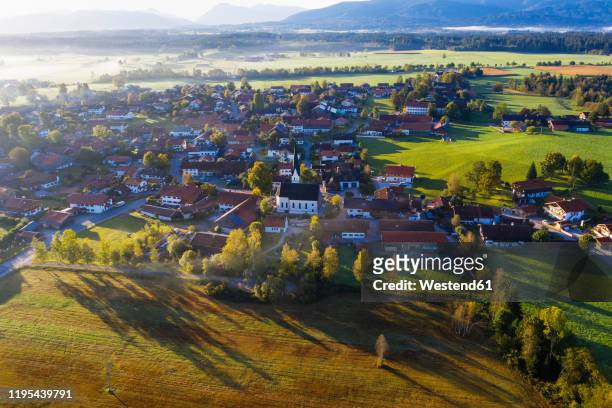 germany, bavaria, upper bavaria, toelzer land, sachsenkam, aerial view of village - village stock-fotos und bilder