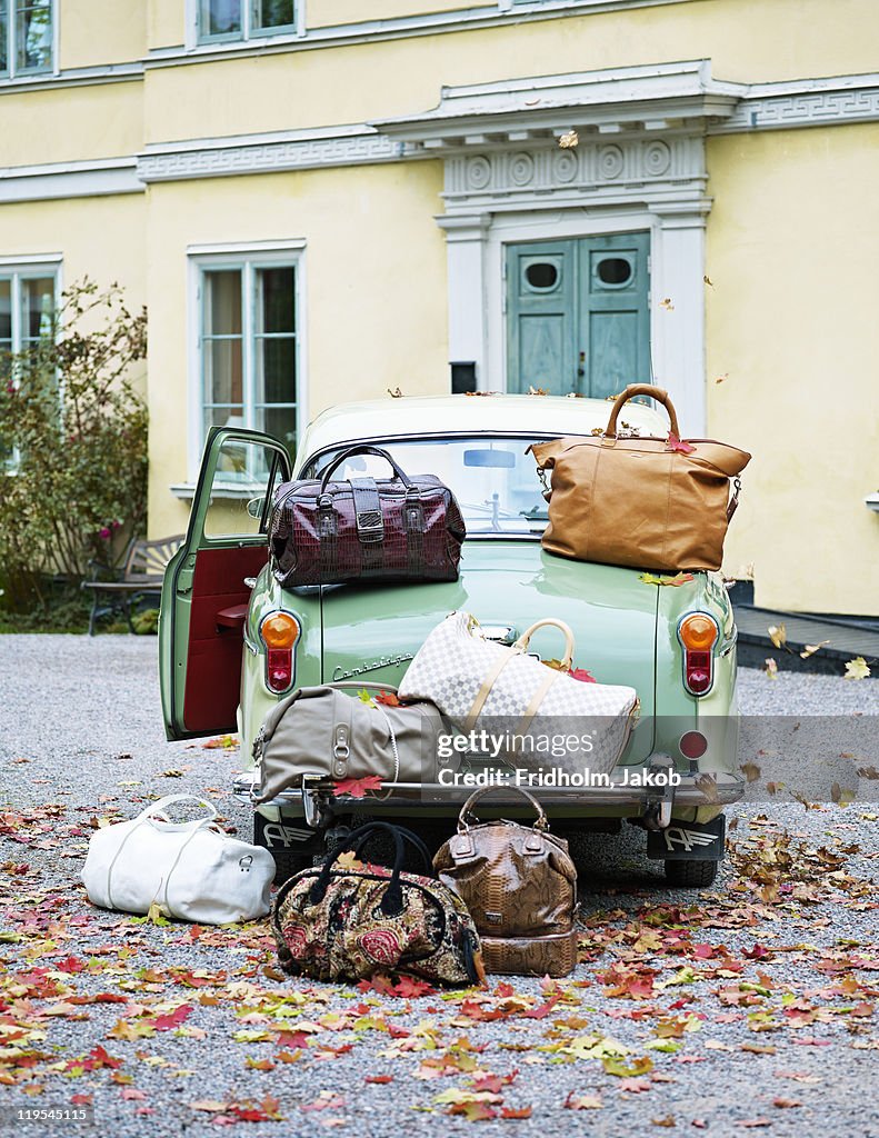 Vintage car with lots of luggage