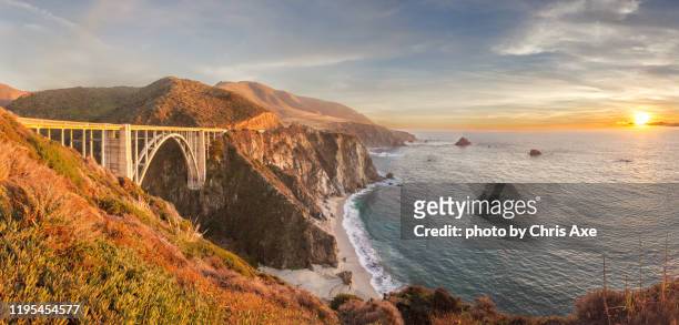 bixby bridge sunset panorama - big sur, ca - big sur coast stock pictures, royalty-free photos & images