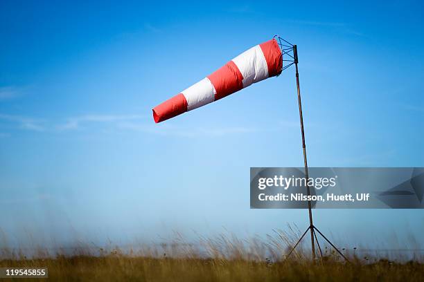 windsock against sky - windsock stock pictures, royalty-free photos & images