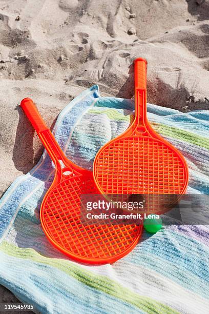 beach tennis set on beach - stockholm beach stock pictures, royalty-free photos & images