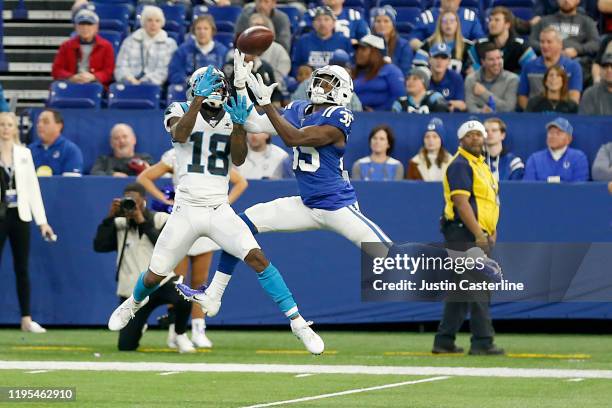 Pierre Desir of the Indianapolis Colts intercepts the ball in the game against the Carolina Panthers during the fourth quarter at Lucas Oil Stadium...