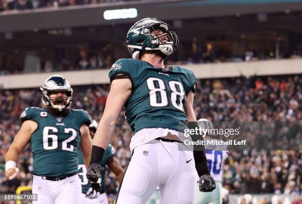 Dallas Goedert of the Philadelphia Eagles celebrates after scoring a touchdown during the first quarter against the Dallas Cowboys in the game at...