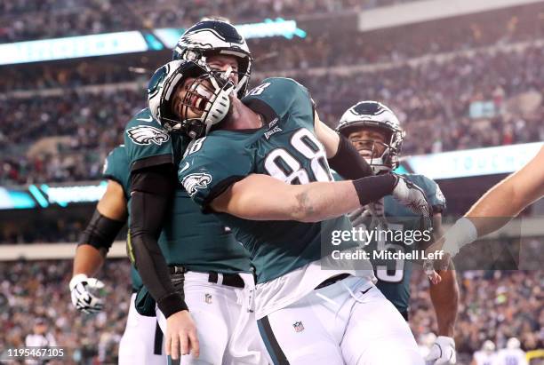 Dallas Goedert of the Philadelphia Eagles celebrates after scoring a touchdown during the first quarter against the Dallas Cowboys in the game at...