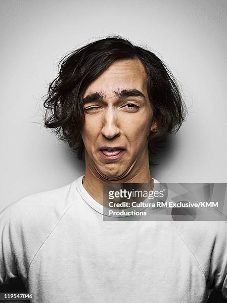 man making a face - offensive stockfoto's en -beelden