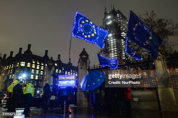 Anti-Brexit protestors seen outside the Houses of Parliament in London. On Wednesday, 22 January 2019, in London, United Kingdom.
