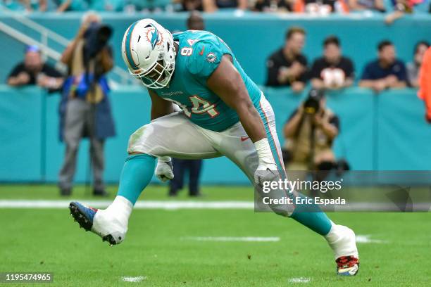 Christian Wilkins of the Miami Dolphins celebrates after a sack during the second half against the Cincinnati Bengals at Hard Rock Stadium on...