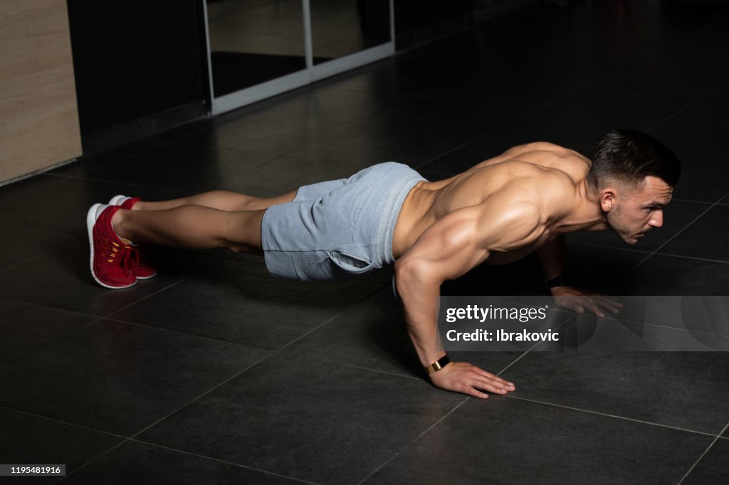 Athlete Exercising Push Ups