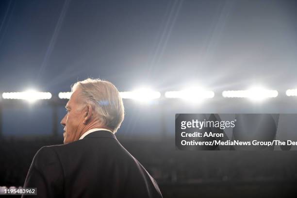 Denver Broncos president of football operations John Elway watches the late action agains the Detroit Lions during the fourth quarter of Denver's...