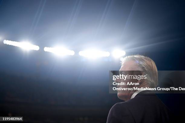 Denver Broncos president of football operations John Elway watches the late action agains the Detroit Lions during the fourth quarter of Denver's...