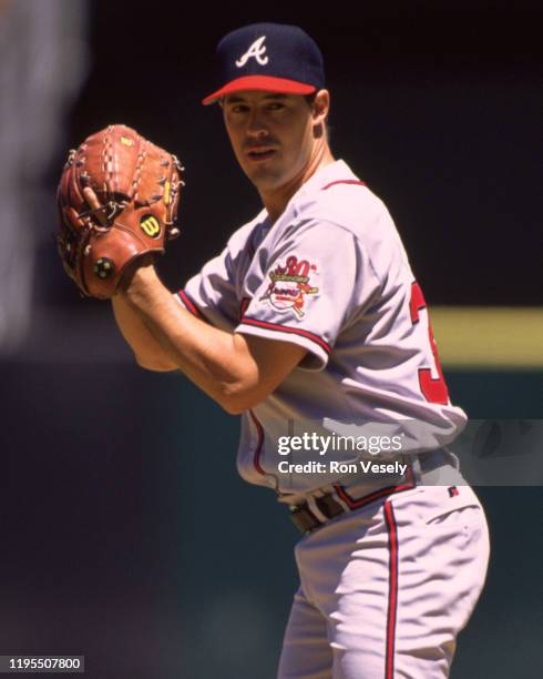 Greg Maddux of the Atlanta Braves pitches during an MLB game versus the San Francisco Giants at Candlestick Park in San Francisco, California during...