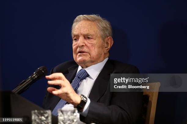George Soros, billionaire and founder of Soros Fund Management LLC, speaks at an event on day three of the World Economic Forum in Davos,...