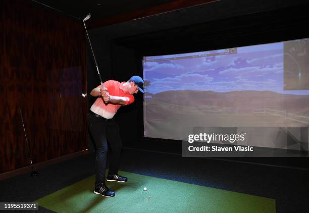 Golf Pro Tyler Williams gives lessons in Putting Room at relaunch of New York lifestyle magazine AVENUE at Hudson Yards on January 22, 2020 in New...