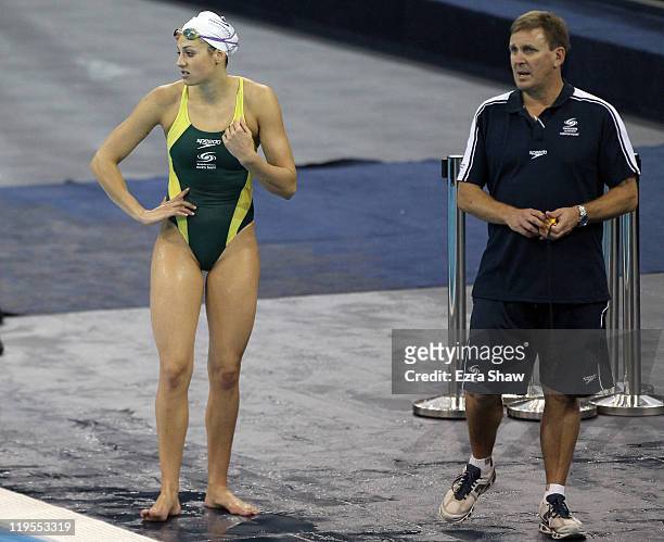 Stephanie Rice of Australia talks with her coach Michael Bohl during a swimming training session during Day Seven of the 14th FINA World...
