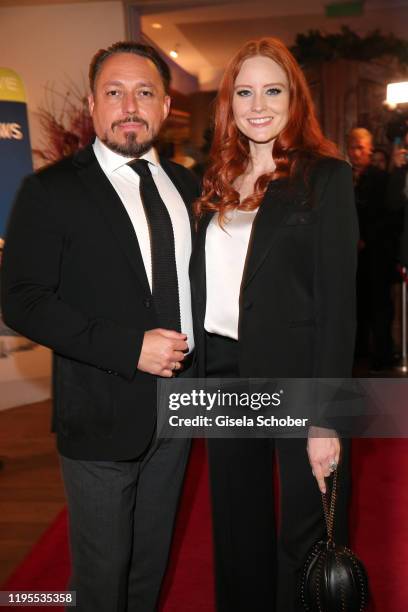 Klemens Hallmann and Barbara Meier during the Schwarzenegger climate initiative charity dinner prior the Hahnenkamm Ski Races at Country Club on...
