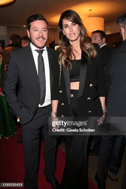 Rene Benko and his wife Nathalie Benko during the Schwarzenegger climate initiative charity dinner prior the Hahnenkamm Ski Races at Country Club on...