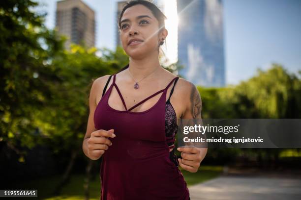 taking her cardio session in the park - argentina training session stock pictures, royalty-free photos & images