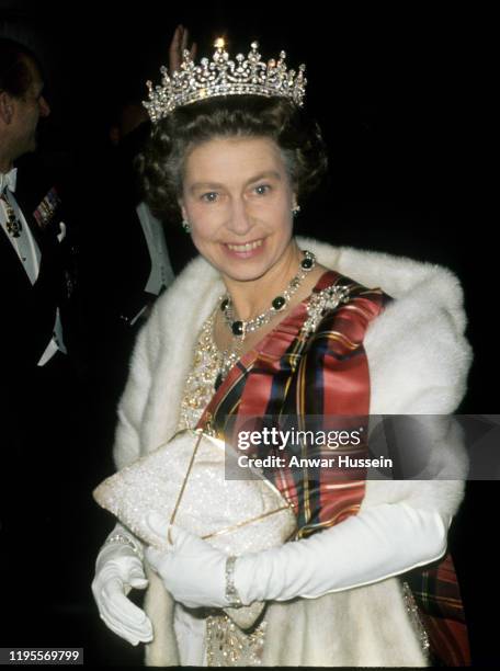 Queen Elizabeth ll smiles as she arrives to attend a banquet during a State Visit to the United States of America in July, 1976 in the United States.