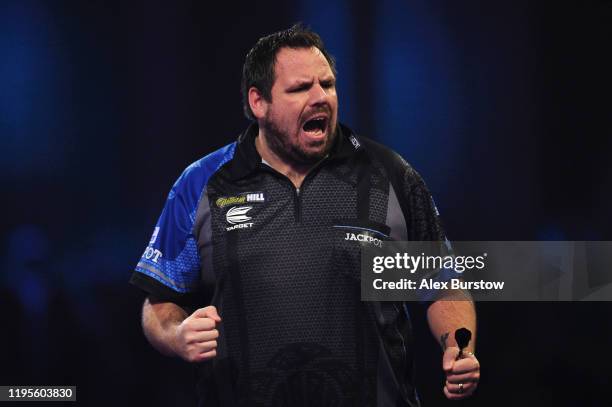 Adrian Lewis of England celebrates in his Third Round match against Darren Webster of England during Day Eleven of the 2020 William Hill World Darts...