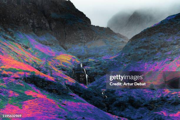 stunning infrared photography landscape of the highlands mountains in scotland. - color blindness stock pictures, royalty-free photos & images