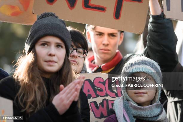 Swedish climate activist Greta Thunberg marches during a "Friday for future" youth demonstration in a street of Davos on January 24, 2020 on the...