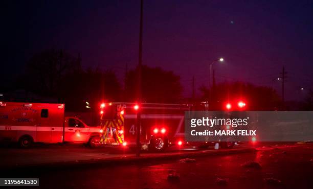 Firefighters and emergency services arrive at a scne of a reported explosion in Houston, Texas, on January 24, 2020. - A large explosion shook the US...