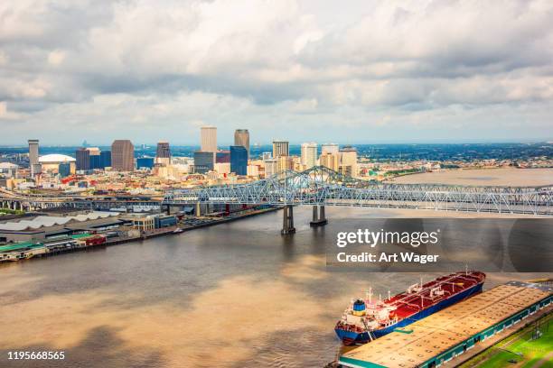 aerial view of downtown new orleans - new orleans bridge stock pictures, royalty-free photos & images