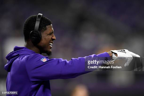 Cornerback Xavier Rhodes of the Minnesota Vikings warms up before the game against the Green Bay Packers at U.S. Bank Stadium on December 23, 2019 in...