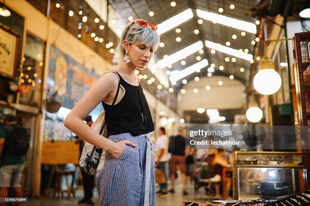 Trendy girl at the street market in San Telmo, Buenos Aires