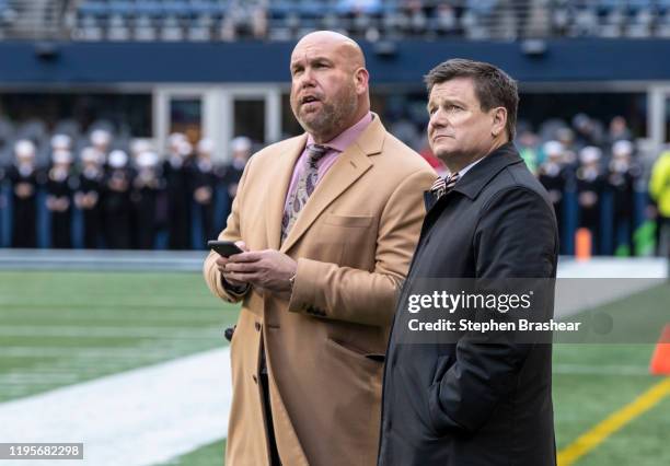 Arizona Cardinals general manager Steve Keim and owner Michael Bidwell stand on the sidlines during warmups before game between the Arizona Cardinals...