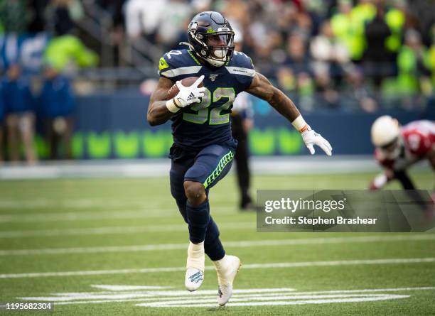 Running back Chris Carson of the Seattle Seahawks rushes the ball during a game against the Arizona Cardinals at CenturyLink Field on December 22,...