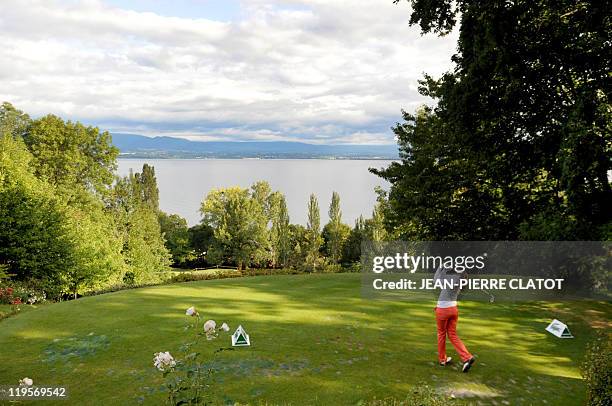 Spanish golfer Azahara Munoz hits a drive during the Evian Masters Golf Tournament, on July 22, 2011 in Evian-les-Bains, French Alps. Sweden's Maria...