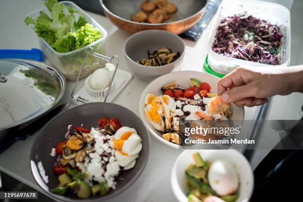 preparing ketogenic diet food in kitchen - low carb bildbanksfoton och bilder