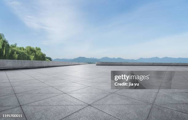 the stone platform of the park. - concrete architecture stock pictures, royalty-free photos & images