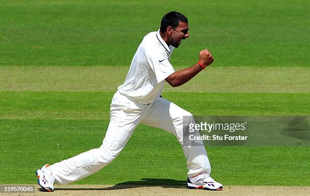 India bowler Praveen Kumar celebrates after dismissing Jonathan Trott during day two of the 1st npower test match between England and India at Lords...