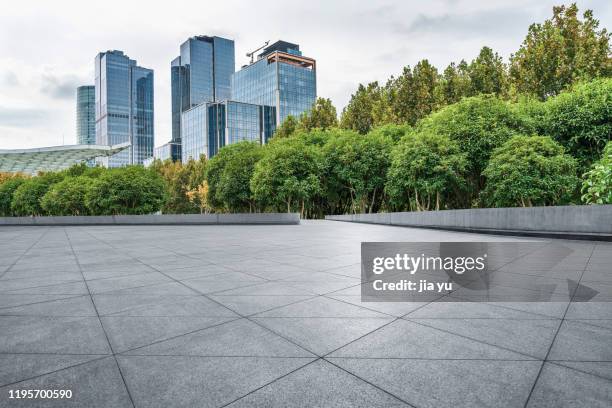 stone platform and modern architecture - city trees stock pictures, royalty-free photos & images