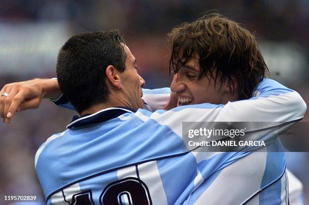 Hernan Crespo of Argentina celebrates with Cristian Gonzalez after scoring the third goal against Colombia 03 June 2001 on the Monumental Stadium in...